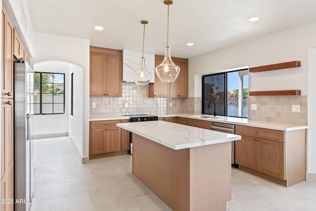 3520 N 110th Ave, Avondale, AZ 85392 - kitchen featuring a sink, a kitchen island, open shelves, hanging light fixtures, and stainless steel appliances