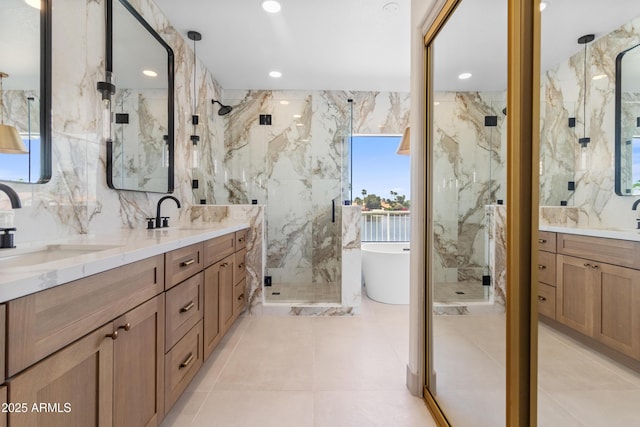3520 N 110th Ave, Avondale, AZ 85392 - full bath with tile walls, a sink, and a marble finish shower