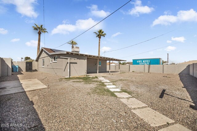 view of yard with a patio area and a fenced backyard