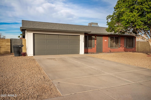 single story home with a garage