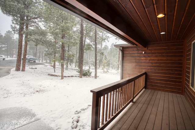 view of snow covered deck