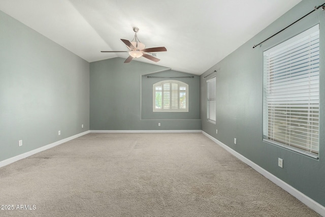 1051 E Julie Ave, San Tan Valley, AZ 85140 - unfurnished room featuring carpet floors, ceiling fan, vaulted ceiling, and baseboards