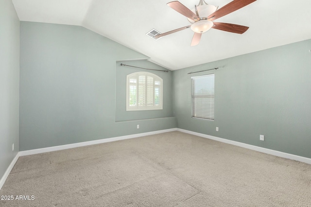 1051 E Julie Ave, San Tan Valley, AZ 85140 - empty room with ceiling fan, visible vents, carpet flooring, lofted ceiling, and baseboards