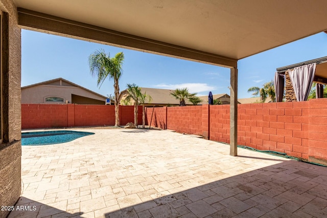 1051 E Julie Ave, San Tan Valley, AZ 85140 - view of patio / terrace with a fenced in pool and a fenced backyard