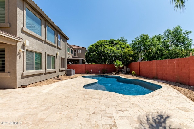 1051 E Julie Ave, San Tan Valley, AZ 85140 - view of pool with central air condition unit, a fenced in pool, a patio area, and a fenced backyard