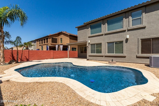 1051 E Julie Ave, San Tan Valley, AZ 85140 - view of pool featuring a fenced in pool, a patio area, central AC, and a fenced backyard