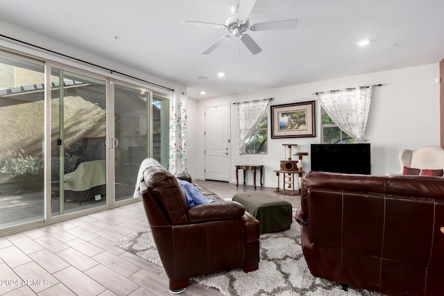 living room featuring ceiling fan