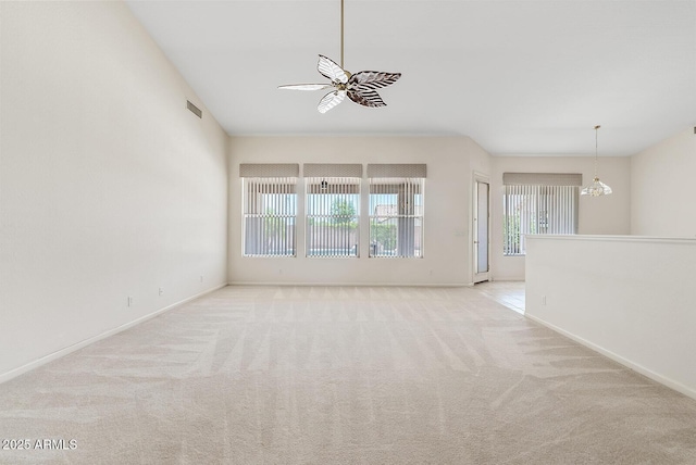 4701 W Fallen Leaf Ln, Glendale, AZ 85310 - carpeted spare room featuring ceiling fan and a chandelier