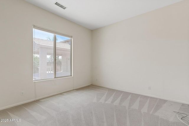 4701 W Fallen Leaf Ln, Glendale, AZ 85310 - unfurnished room featuring light colored carpet and baseboards