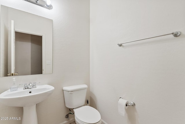 4701 W Fallen Leaf Ln, Glendale, AZ 85310 - bathroom featuring toilet and a sink
