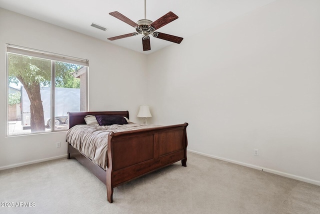 4701 W Fallen Leaf Ln, Glendale, AZ 85310 - bedroom with light carpet and ceiling fan
