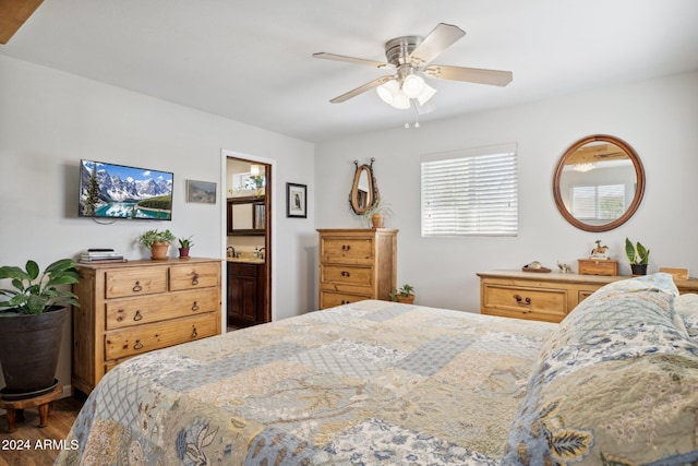 36425 N 10th St, Phoenix, AZ 85086 - bedroom featuring wood finished floors, a ceiling fan, and ensuite bath