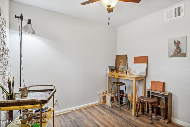 office area featuring wood-type flooring and ceiling fan