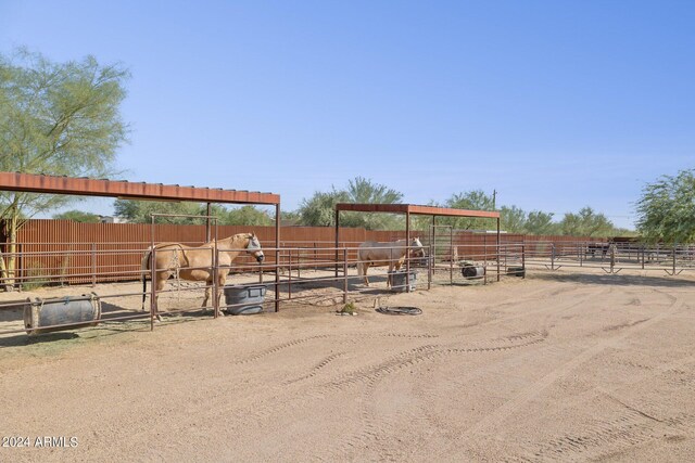 36425 N 10th St, Phoenix, AZ 85086 - view of yard featuring an exterior structure, a view of countryside, and an outdoor structure