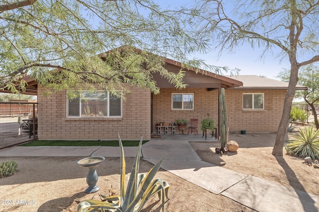 view of front of property with a patio area