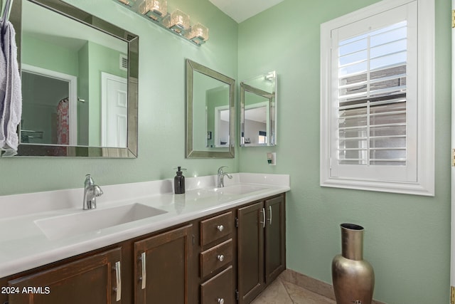 bathroom with vanity and tile patterned floors