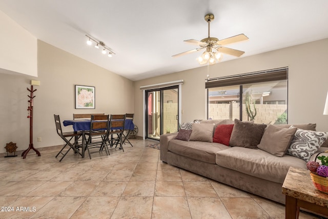 living room with lofted ceiling, ceiling fan, and rail lighting