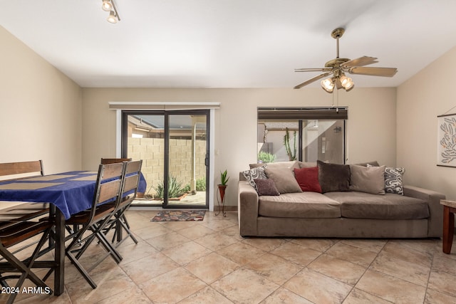 living room featuring ceiling fan