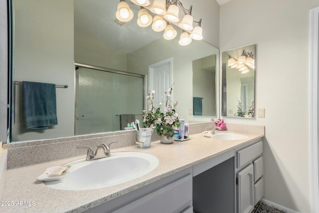 bathroom with vanity and walk in shower
