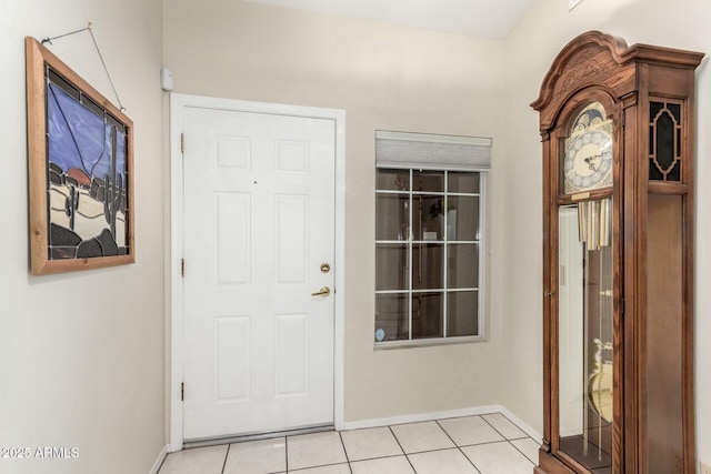 foyer with light tile patterned floors