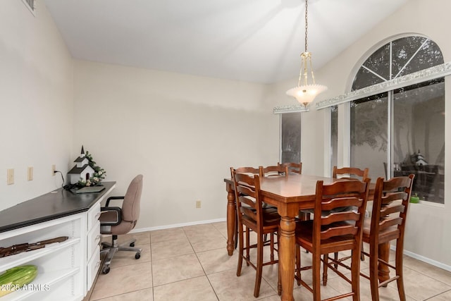 dining area featuring light tile patterned floors