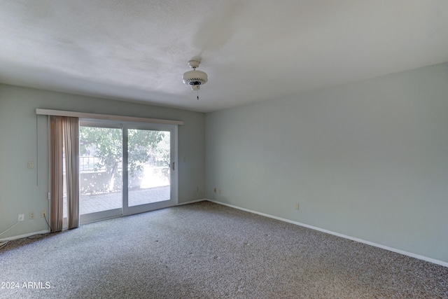 unfurnished room featuring carpet floors