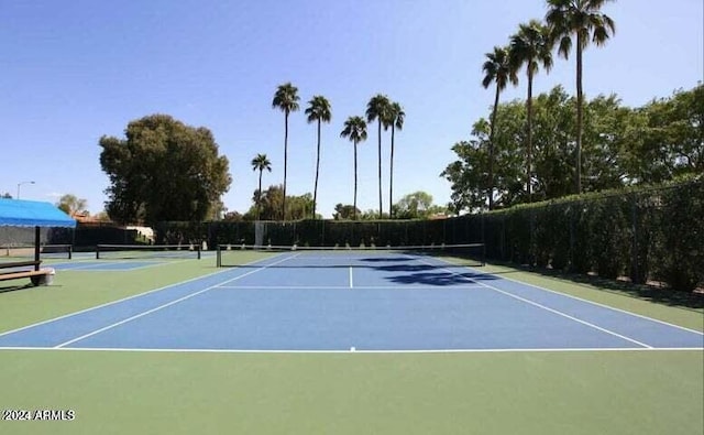 view of tennis court with basketball court