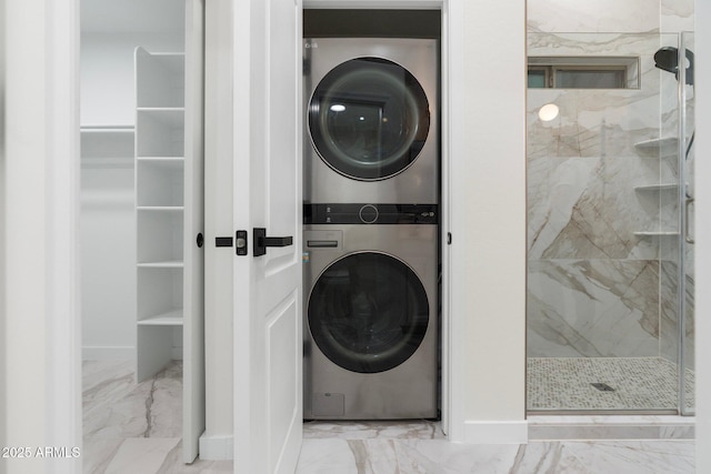 4960 E Colonial Dr, Chandler, AZ 85249 - laundry room featuring stacked washer / drying machine, marble finish flooring, and baseboards