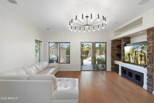 4960 E Colonial Dr, Chandler, AZ 85249 - living area featuring hardwood / wood-style flooring, baseboards, and a chandelier