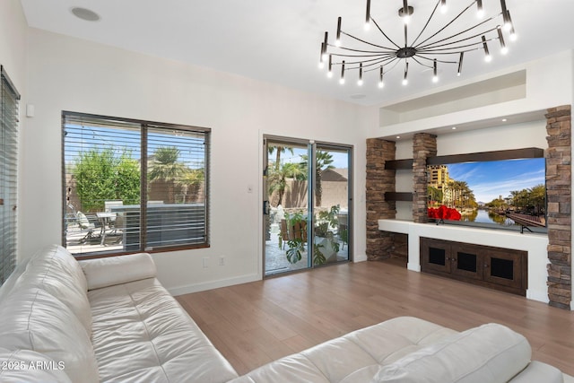 4960 E Colonial Dr, Chandler, AZ 85249 - living area with wood finished floors, healthy amount of natural light, baseboards, and track lighting