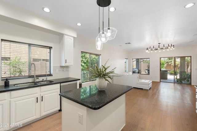 4960 E Colonial Dr, Chandler, AZ 85249 - kitchen with a sink, white cabinetry, pendant lighting, a center island, and recessed lighting