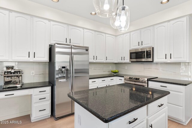 4960 E Colonial Dr, Chandler, AZ 85249 - kitchen featuring stainless steel appliances, light wood-style floors, recessed lighting, backsplash, and white cabinetry