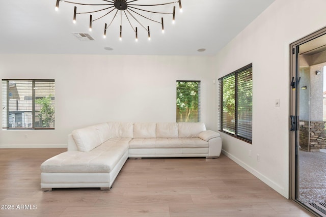 4960 E Colonial Dr, Chandler, AZ 85249 - living room with light wood-style flooring and baseboards