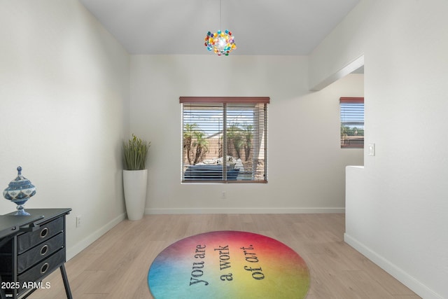 4960 E Colonial Dr, Chandler, AZ 85249 - interior space with healthy amount of natural light, wood finished floors, and baseboards