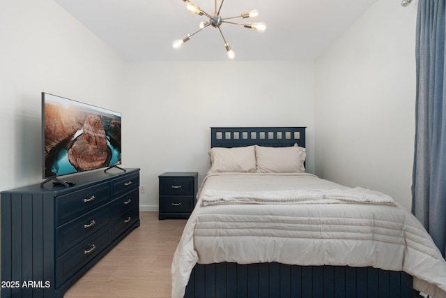 4960 E Colonial Dr, Chandler, AZ 85249 - bedroom featuring light wood-type flooring, a chandelier, and baseboards