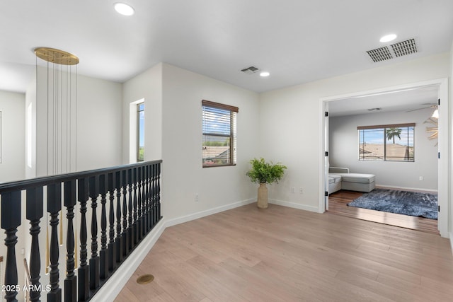 4960 E Colonial Dr, Chandler, AZ 85249 - hallway featuring light wood-style flooring, recessed lighting, and baseboards