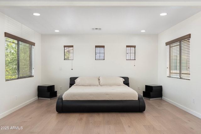 4960 E Colonial Dr, Chandler, AZ 85249 - bedroom with light wood finished floors, recessed lighting, and baseboards