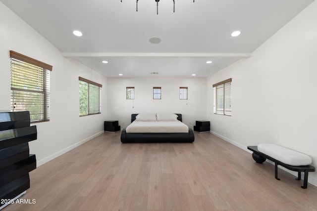 4960 E Colonial Dr, Chandler, AZ 85249 - bedroom with light wood-style flooring, multiple windows, baseboards, and recessed lighting