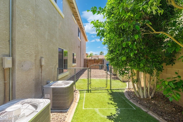 4960 E Colonial Dr, Chandler, AZ 85249 - view of yard with a gate and cooling unit