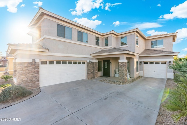 4960 E Colonial Dr, Chandler, AZ 85249 - view of front of home featuring a garage, stone siding, stucco siding, concrete driveway, and a tile roof