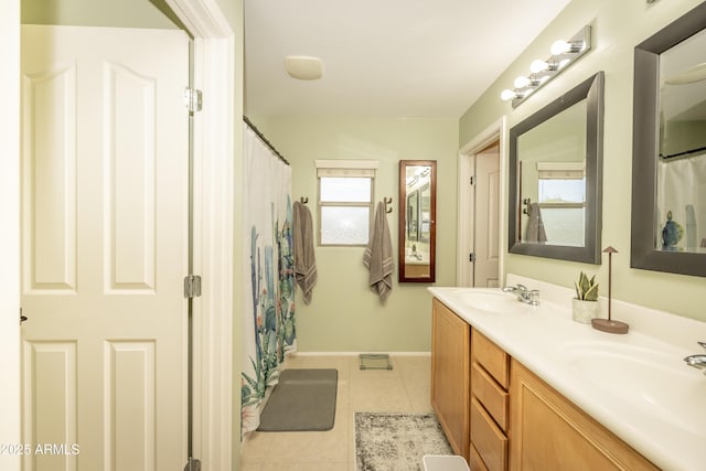29110 N 24th Ln, Phoenix, AZ 85085 - full bath with double vanity, tile patterned flooring, baseboards, and a shower with curtain