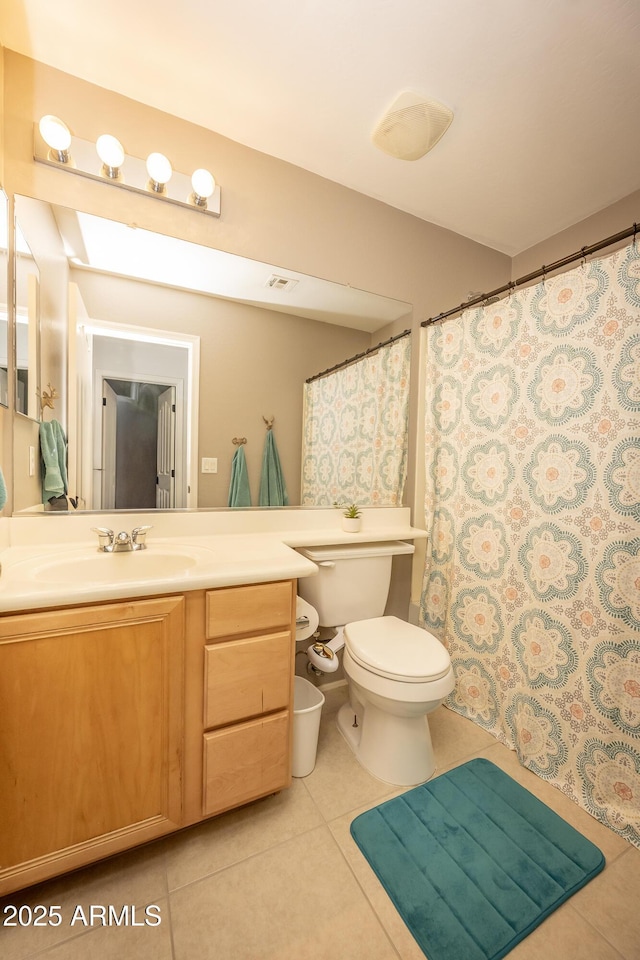 29110 N 24th Ln, Phoenix, AZ 85085 - full bath featuring tile patterned floors, toilet, and vanity