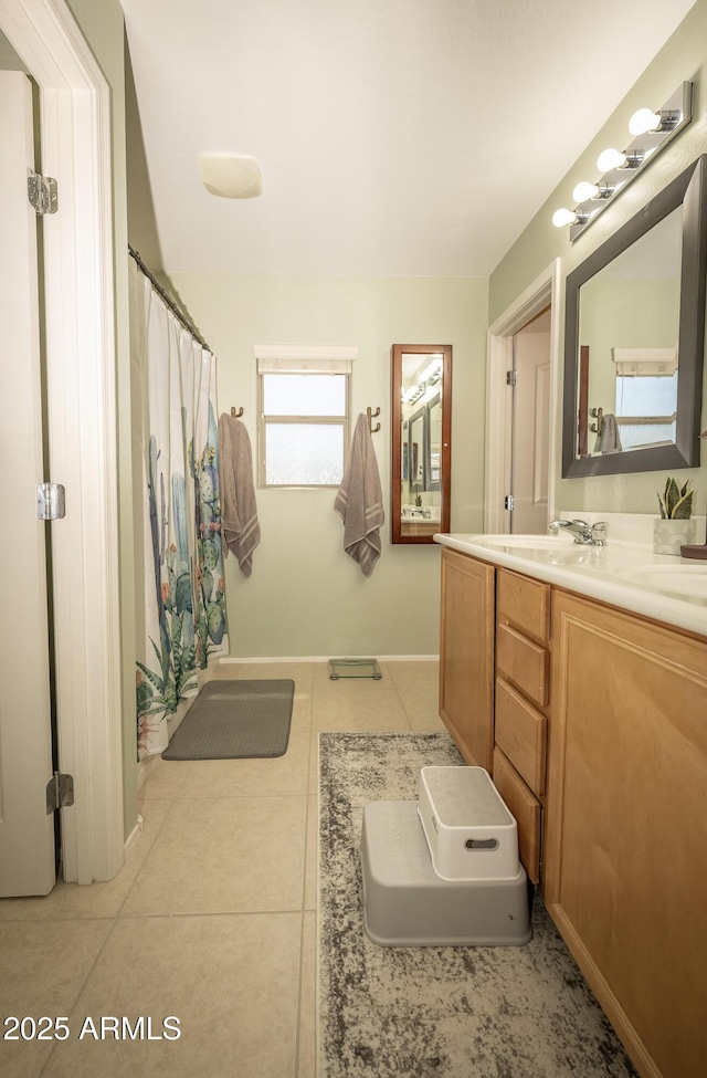 29110 N 24th Ln, Phoenix, AZ 85085 - bathroom with vanity, tile patterned flooring, baseboards, and curtained shower