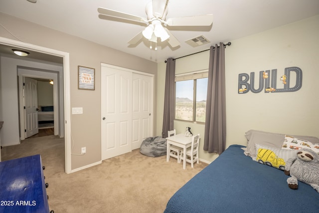 29110 N 24th Ln, Phoenix, AZ 85085 - bedroom with carpet flooring, a closet, ceiling fan, and baseboards