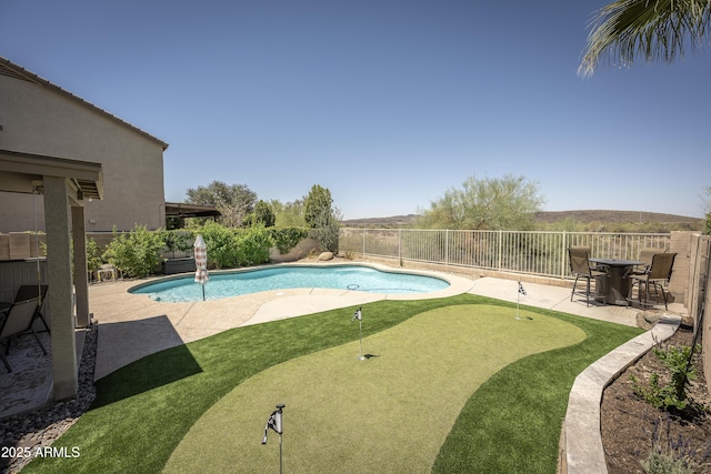 29110 N 24th Ln, Phoenix, AZ 85085 - view of swimming pool with a putting green, a patio area, and a fenced backyard