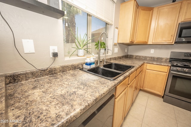 29110 N 24th Ln, Phoenix, AZ 85085 - kitchen featuring appliances with stainless steel finishes, light brown cabinets, a sink, and light tile patterned flooring