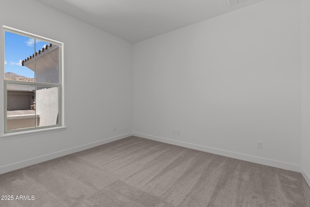 21541 W Mariposa St, Buckeye, AZ 85396 - carpeted spare room featuring baseboards
