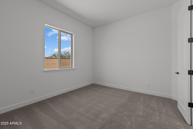 21541 W Mariposa St, Buckeye, AZ 85396 - carpeted spare room with baseboards
