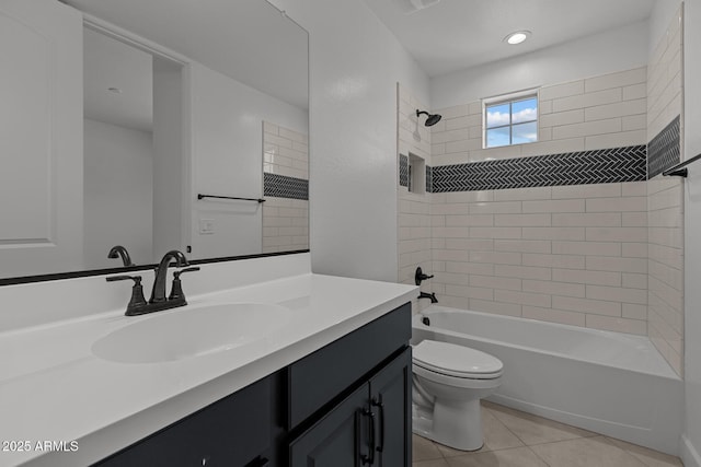 21541 W Mariposa St, Buckeye, AZ 85396 - bathroom with tile patterned floors, toilet, washtub / shower combination, and vanity