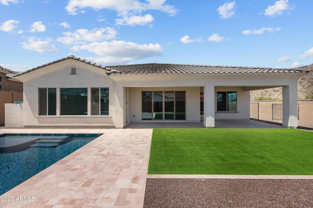 21541 W Mariposa St, Buckeye, AZ 85396 - rear view of house with a patio, an outdoor pool, stucco siding, and a tile roof